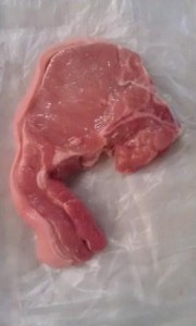 loin chop Figure 4. Loin chop showing elongated transverse process. The muscle above the process is the loin, the smaller muscle below the process is the tenderloin. muscle